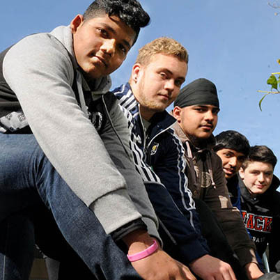 MARIO BARTEL/NEWSLEADER Malik Shabab, Dillon Cusker, Sarban Sidhu, Jashan Taggar and Connor Pattison are sports leadership students at New West secondary school lacing up for a fundraising run/walk to be held at Queen's Park on May 9.